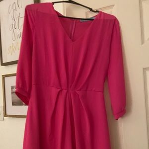 A pink long sleeve romper